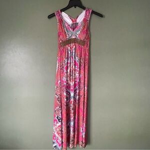 Pink maxi dress with beaded front detail, featuring a flowy design